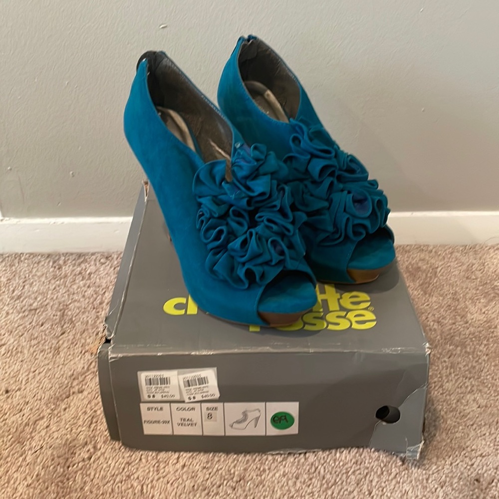 Never worn heels with original box